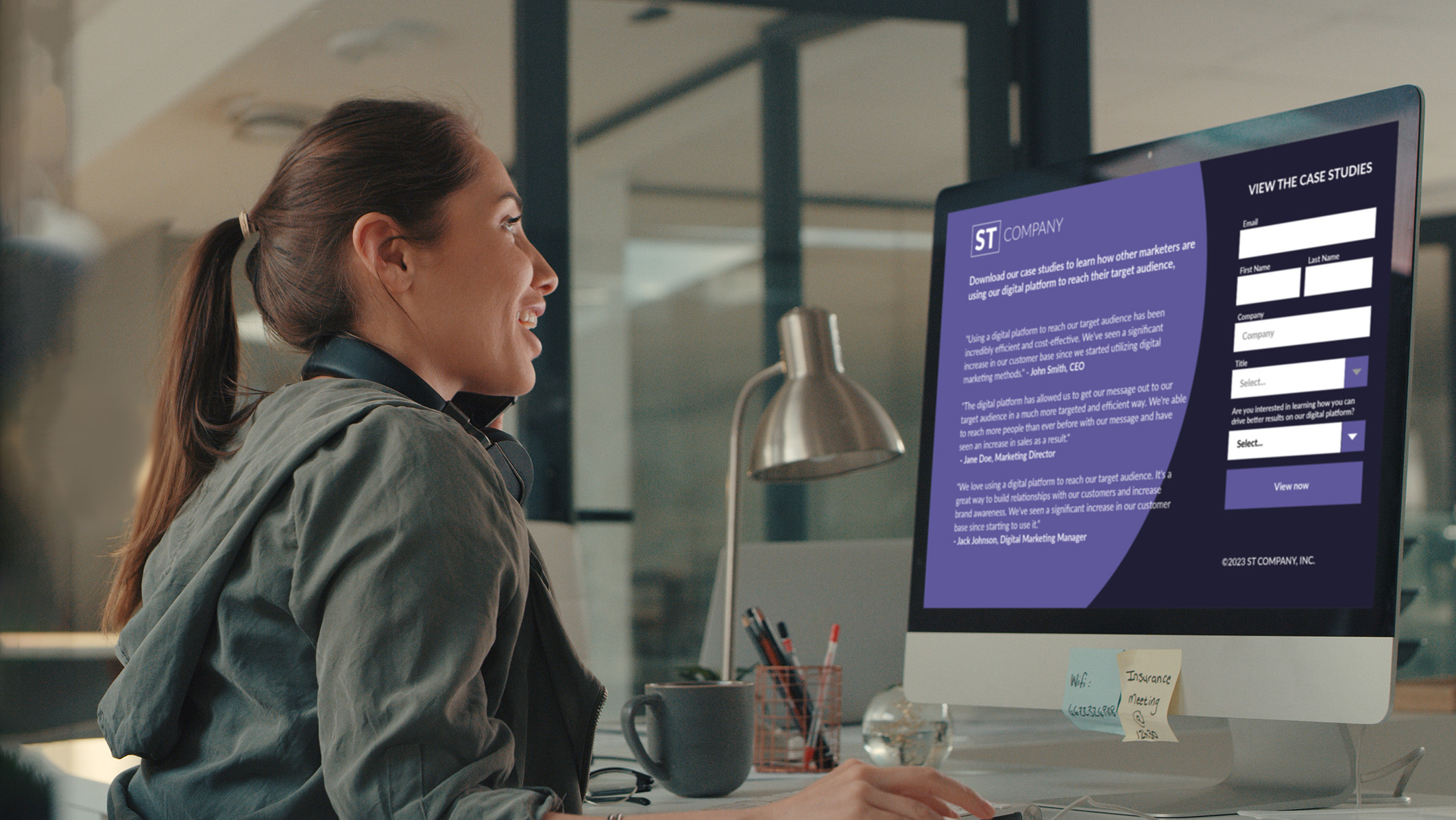 person at computer monitor creating a landing page