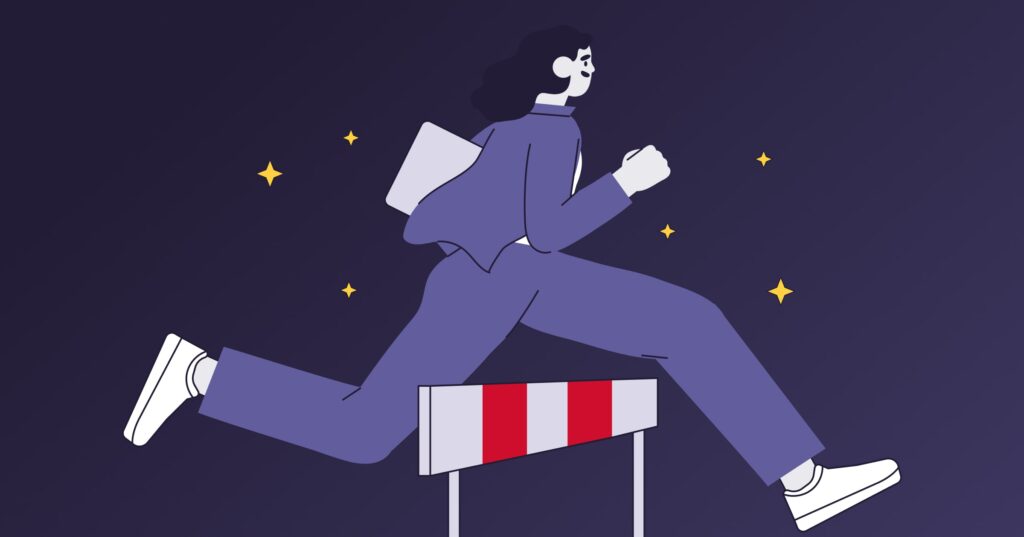 person jumping over a hurdle