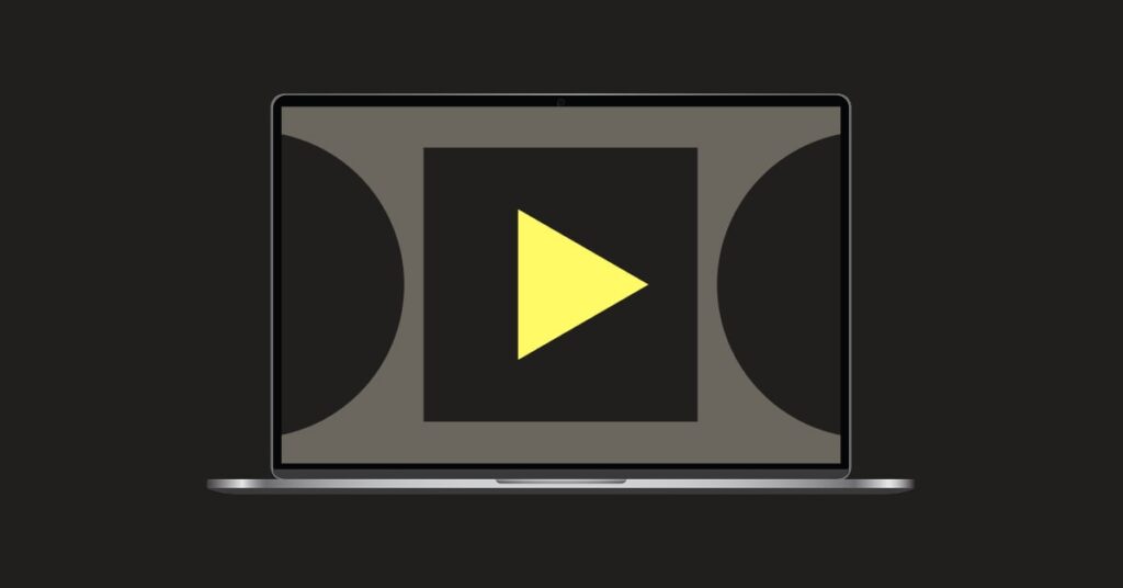 Laptop with a play button and abstract shapes