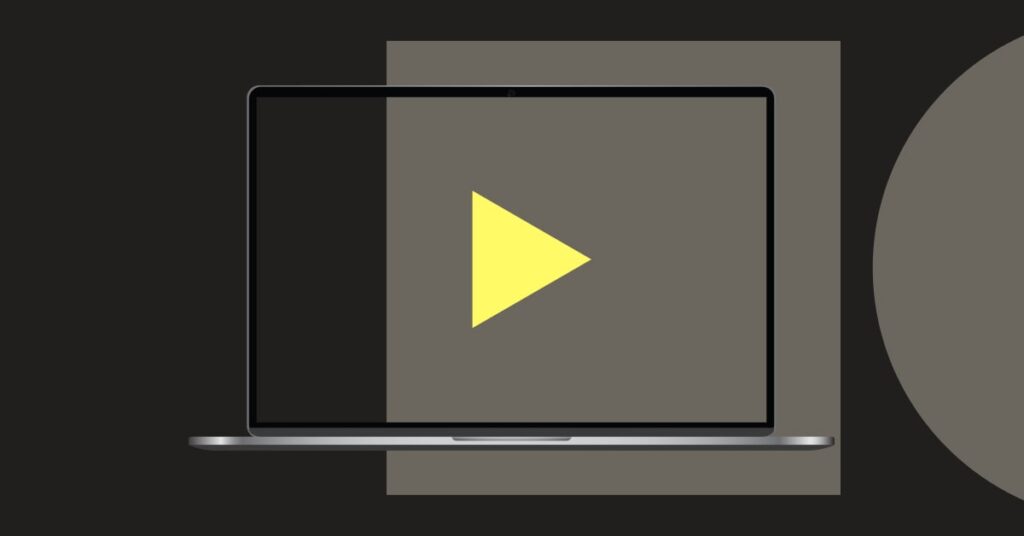 Laptop with a play button and abstract shapes