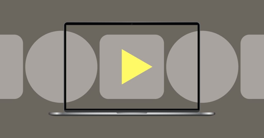 Laptop with a play button and abstract shapes