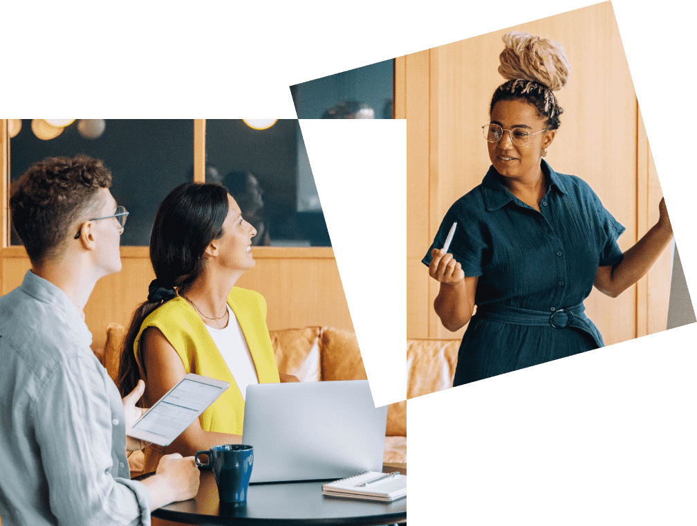 woman talking with two co-workers and writing on white board