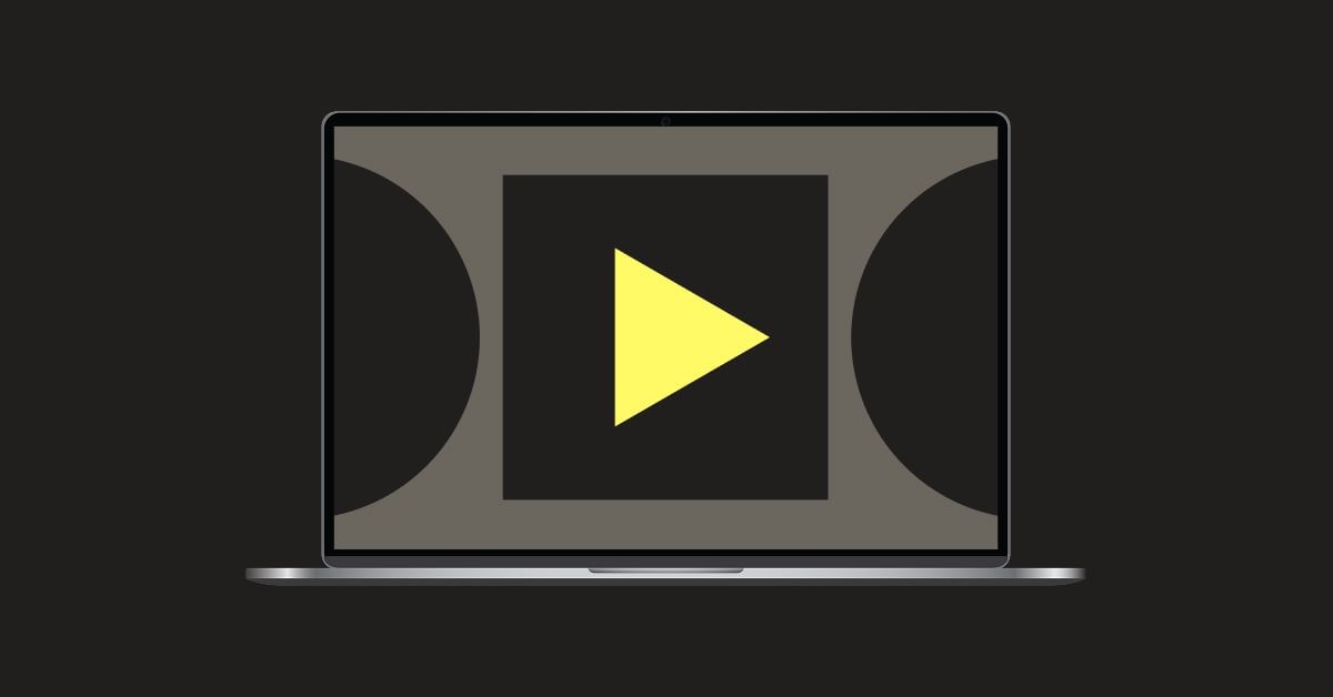 Laptop with a play button and abstract shapes