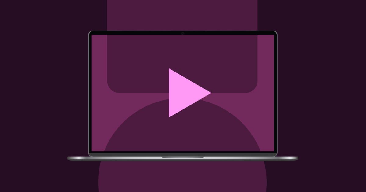 Laptop with a play button and abstract shapes