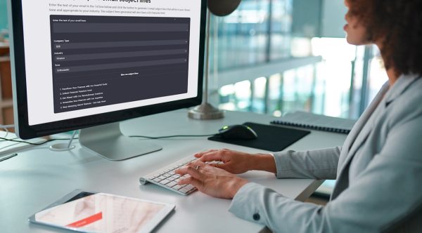 woman working at a screen with a ai subject line generator
