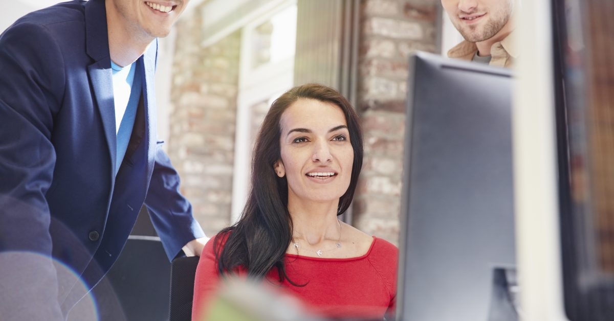 Team working together at a computer