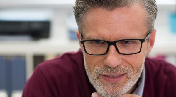 Man looking at computer screen