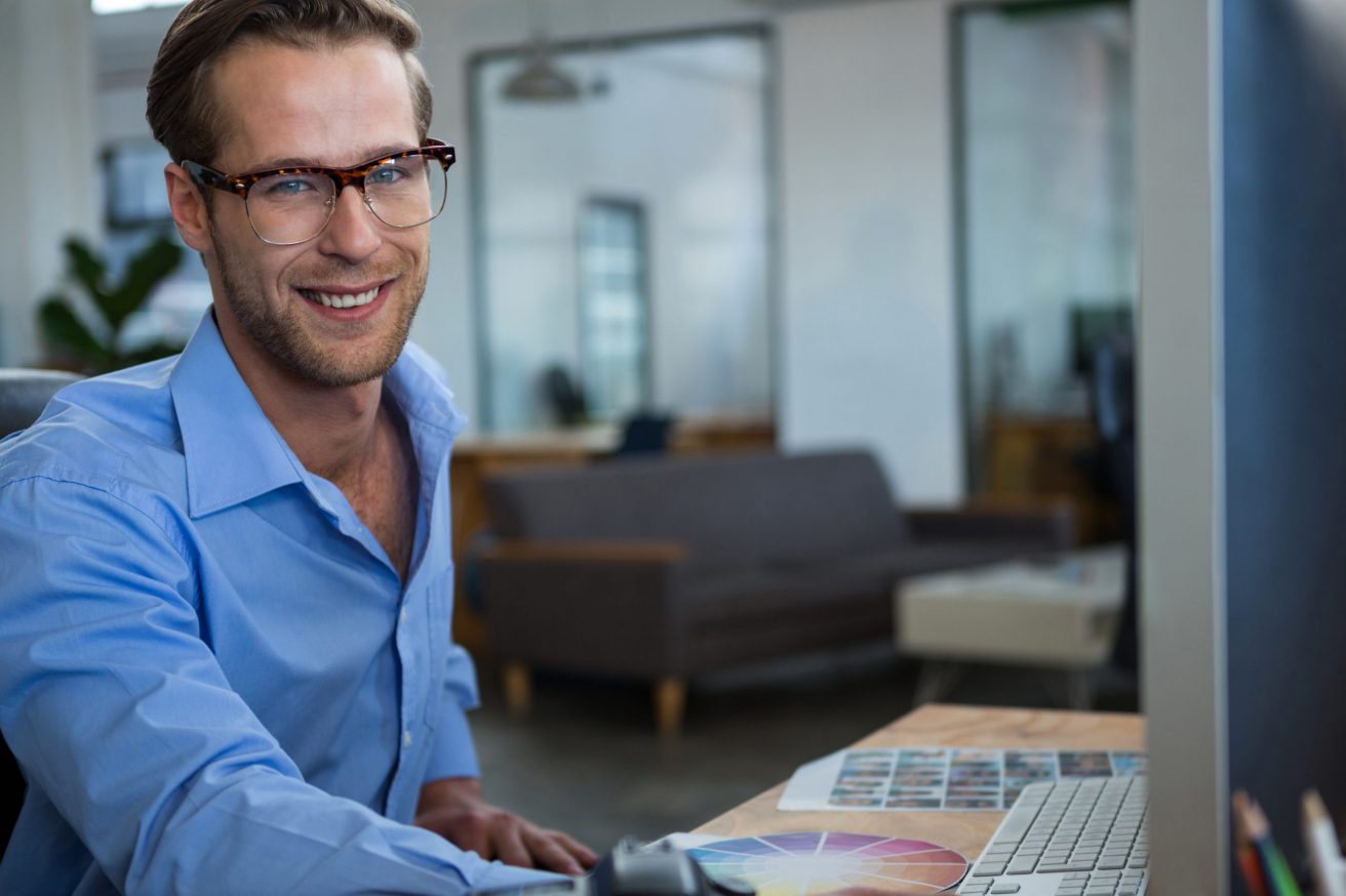 person at a computer monitor
