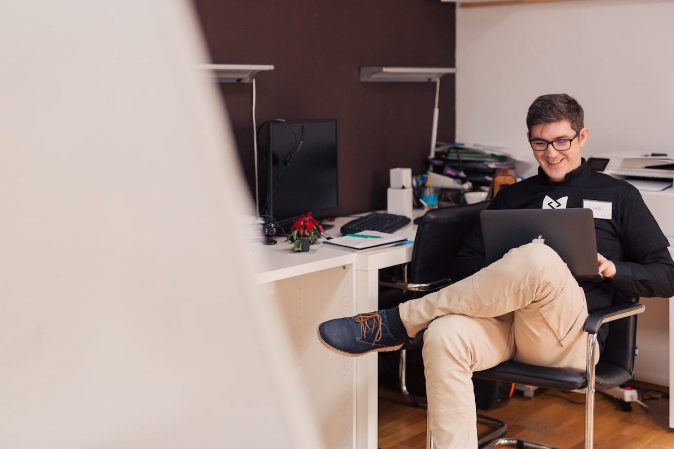 man smile computer office marketing