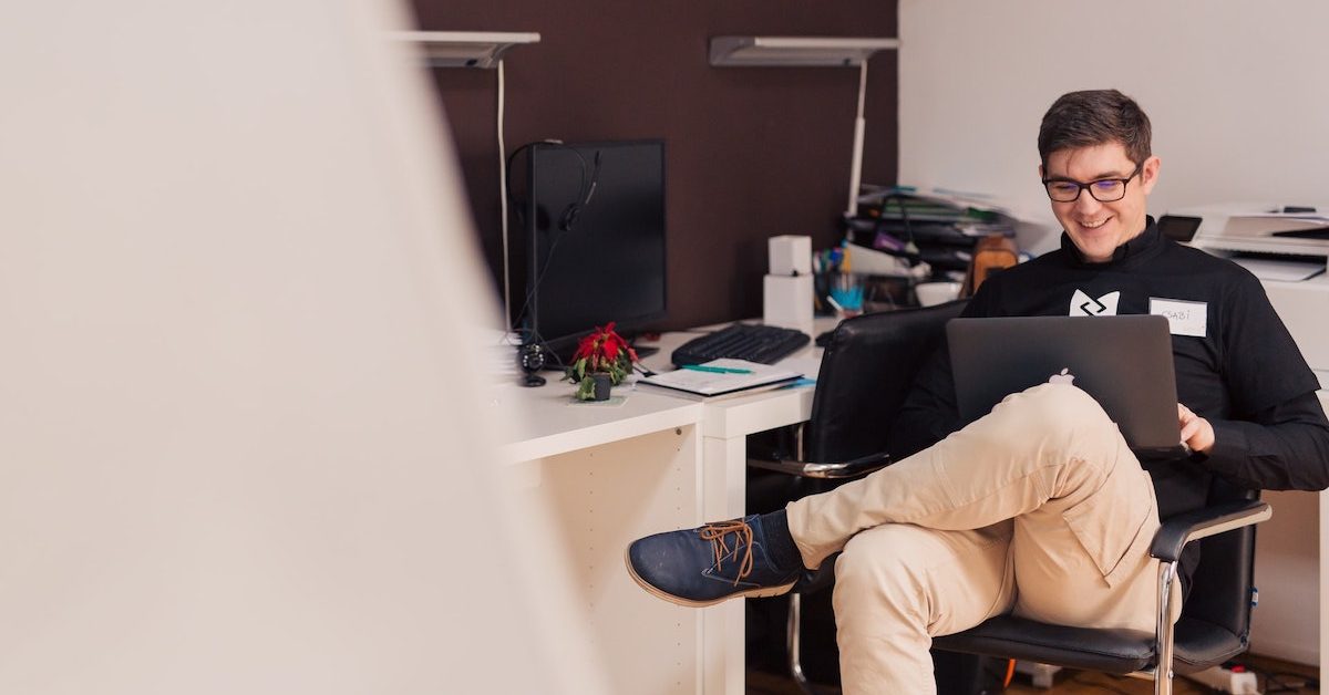 man smile computer office marketing