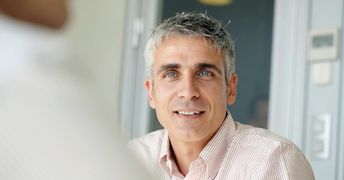 Older business man in meeting