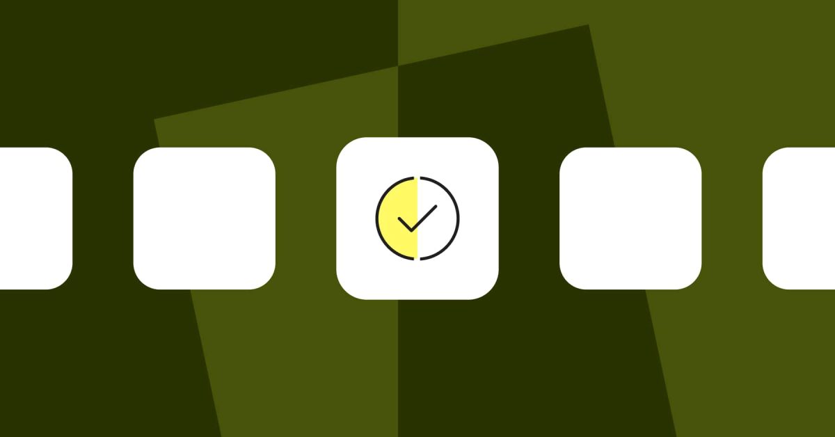 Series of boxes in a row with middle box larger and with a check mark icon